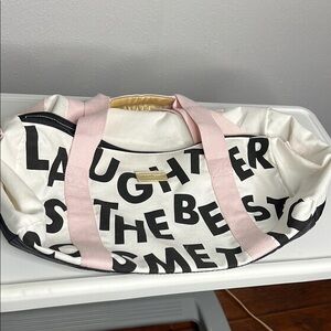 Benefit Pink and Black Travel Bag with Bold Design